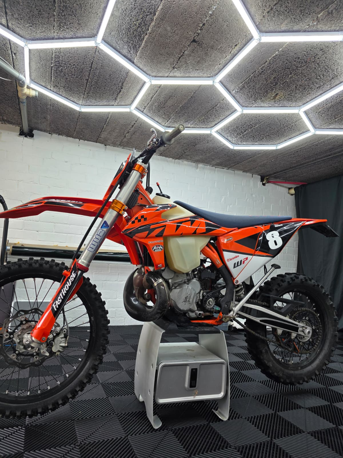 KTM EXC 250 with new stickerset installed, side profile