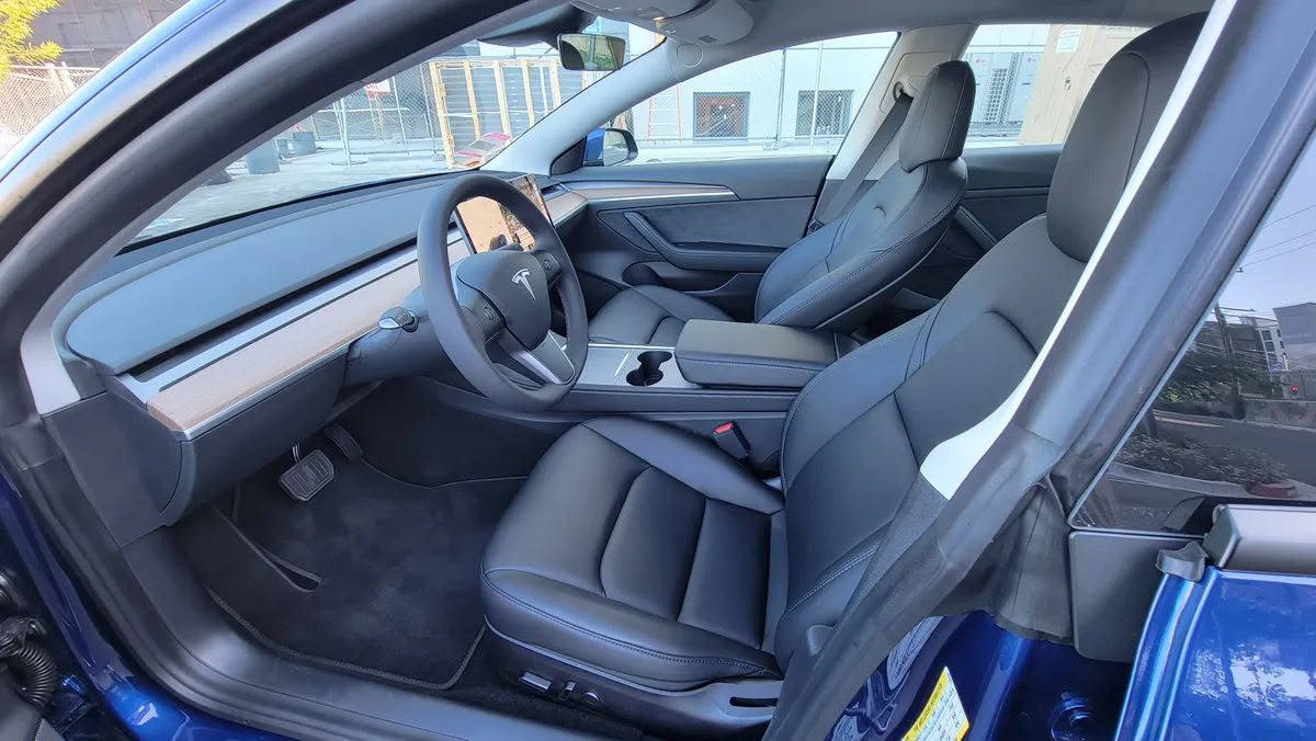 Tesla Model 3 interior before alcantara wrap